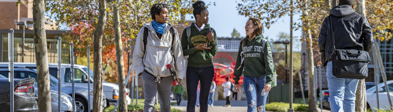 photo of students walking outside on campus