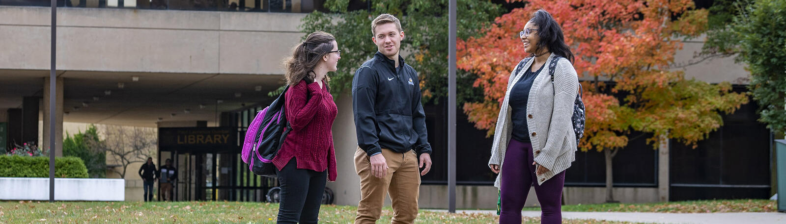 photo of students standing outside and talking at wright state