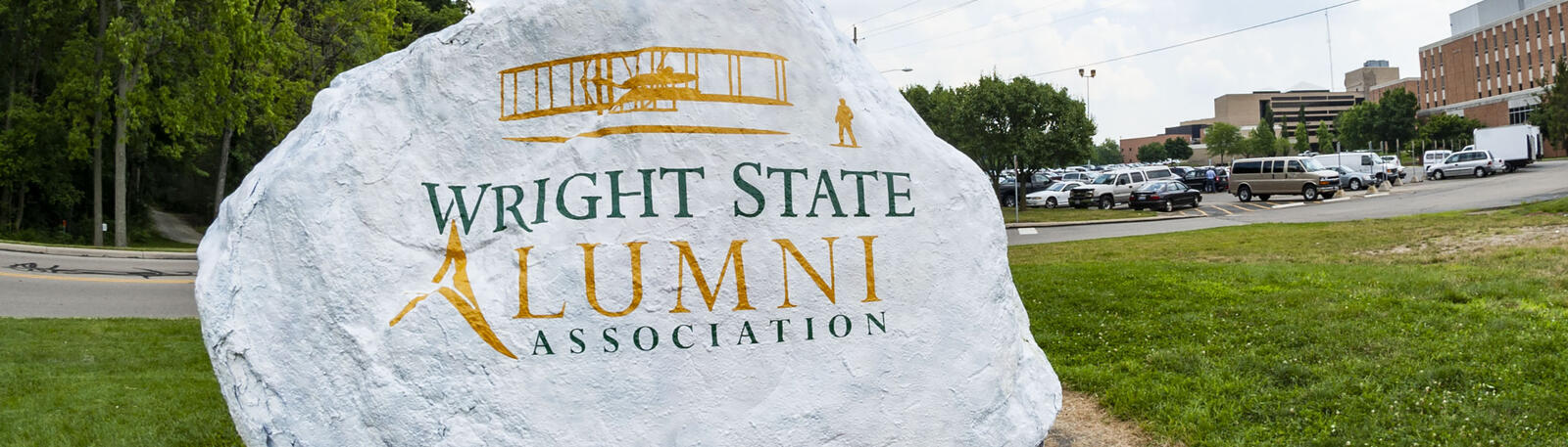 photo of the rock at wright state with the wright state alumni association logo painted on it